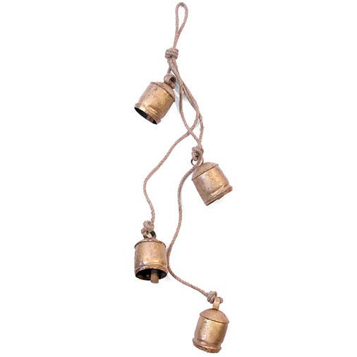 Decorative hanging with five brass bells on a white background
